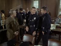 Click to watch 'Log 123: Courtroom' (popup) Adam-12